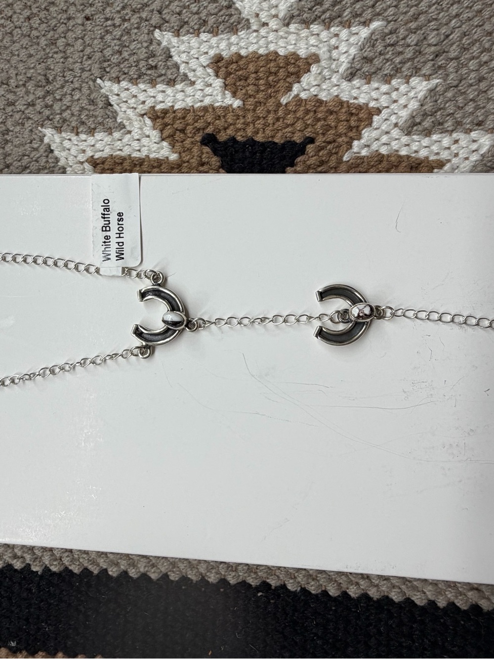 White buffalo and wild horse horseshoe bracelet with attached chain ring sterlin